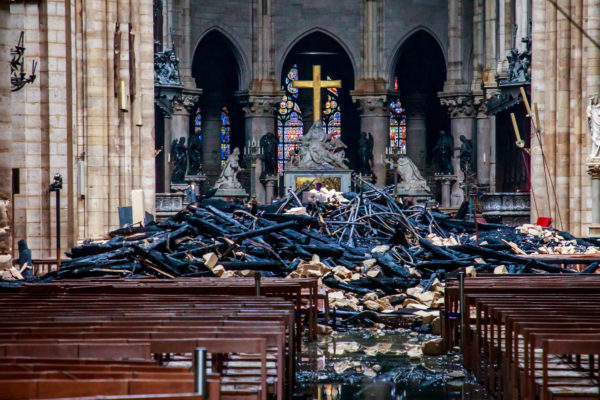 A view of the debris inside Notre-Dame de Paris in the aftermath of a fire that devastated the cathedral on April 16, 2019. Photo by Christophe Petit Tesson/Pool via Reuters