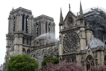 Firefighters work at Notre-Dame Cathedral after a massive fire devastated large parts of the gothic gem in Paris, France on April 16, 2019. Photo by Yves Herman/Reuters