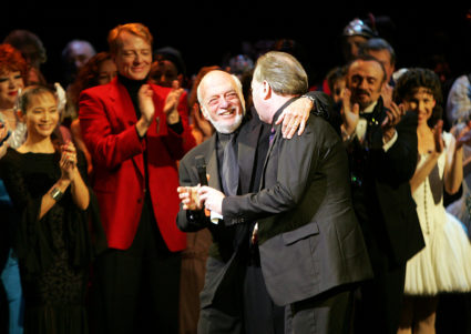 Director Harold Prince (L) and composer Andrew Lloyd Webber greet one another during the curtain call of "The Phantom of the Opera" in New York City in 2006. Photo by Seth Wenig/Reuters