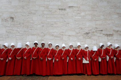 Women dressed as handmaids promoting the Hulu original series "The Handmaid's Tale" stand along a public street during the 2017 South by Southwest (SXSW) Music Film Interactive Festival 2017 in Austin, Texas. Photo by Brian Snyder/Reuters