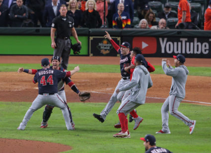 Washington Nationals pitcher Daniel Hudson (44) and catcher Yan Gomes (10) celebrate after defeating the Houston Astros in game seven of the 2019 World Series at Minute Maid Park. The Washington Nationals won the World Series winning four games to three. Mandatory Credit: Erik Williams-USA TODAY Sports