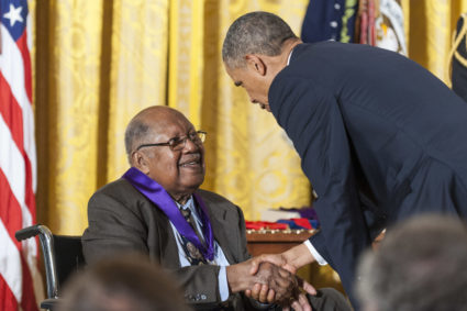 WASHINGTON, DC - JULY 10: U.S. President Barack Obama (R) presents a 2012 National Medal of Arts to Ernest Gaines for his contributions as an author and teacher, during a ceremony in the East Room of the White House on July 10, 2013 in Washington, DC. Gaines' works have shed new light on the African-American experience and given voice to those who have endured injustice. (Photo by Pete Marovich/Getty Images)