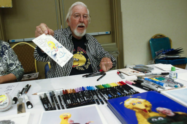 Caroll Spinney signs autographs during the Dean Martin Expo and Nostalgic, Comedy and Comic Convention featuring collections of memorabilia from 1950's and 60's in New York on June 28, 2014. Photo by Eduardo Munoz/Reuters