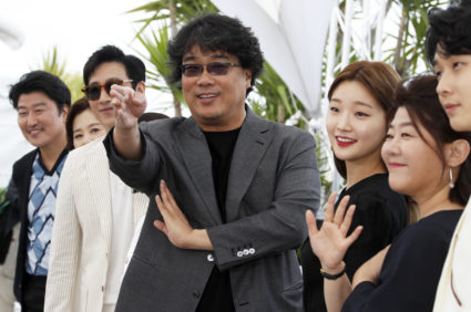 FILE PHOTO: Bong Joon-ho, the director of the film "Parasite" poses with his team at the 72nd Cannes Film Festival on May 22, 2019. Photo by Eric Gaillard/Reuters