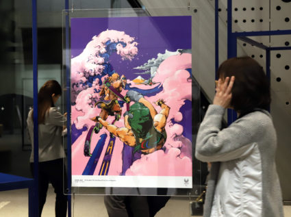 An art poster of Japanese comic artist Hirohiko Araki is displayed at a press preview for the Tokyo 2020 Olympics and Paralympics official art posters exhibition at the Museum of Contemporary Art Tokyo. Photo by Yoshio Tsunoda/AFLO via Reuters