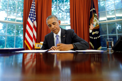 U.S. President Barack Obama signs into law S. 337: FOIA Improvement Act of 2016 and S. 2328: Puerto Rico Oversight, Management and Economic Stability Act at the Oval Office of the White House in Washington, U.S., June 30, 2016. Photo by REUTERS/Carlos Barria/File Photo