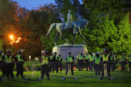 Police deploy around the statue of Civil War Confederate General Robert E. Lee in Charlottesville