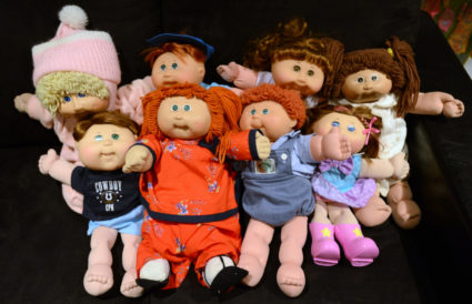 a pile of Cabbage Patch dolls