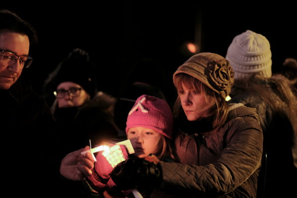 Candle light vigil after a car plowed through a holiday parade, in Waukesha