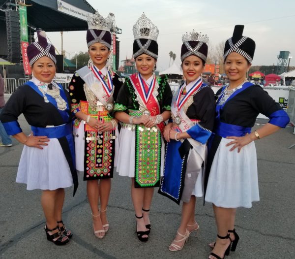 2018 Miss Hmong USA beauty pageant winners in heritage dress at annual Hmong Cultural New Year Celebration in Fresno, California. The event is one of the largest held in the country and is a special place for the Hmong community to exchange and further traditions. Courtesy of Mitch Herr