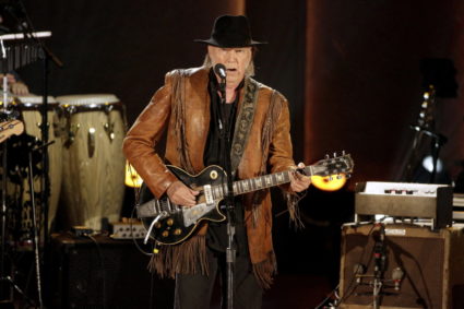 FILE PHOTO: Singer/songwriter Neil Young performs during a concert honoring singer/songwriter Willie Nelson, recipient of ...