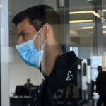 Serbian tennis player Novak Djokovic arrives at Nikola Tesla Airport, after the Australian Federal Court upheld a government decision to cancel his visa to play in the Australian Open, in Belgrade, Serbia January 17, 2022. Photo by Christopher Pike/REUTERS