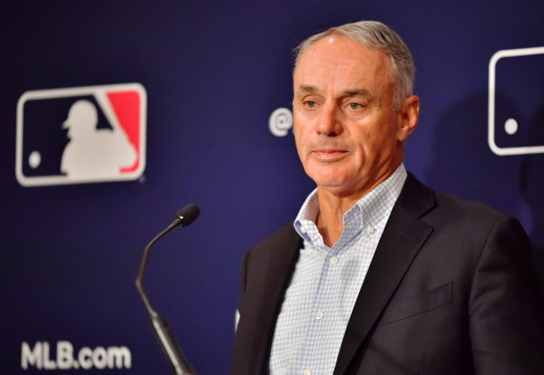 Major League Baseball Commissioner Rob Manfred answers questions during an MLB owner's meeting at the Waldorf Astoria on February 10, 2022 in Orlando, Florida. Manfred addressed the ongoing lockout of players, which owners put in place after the league's collective bargaining agreement ended on December 1, 2021. Photo by Julio Aguilar/Getty Images