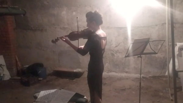 Violinist plays her violin in a bomb shelter in Kharkiv