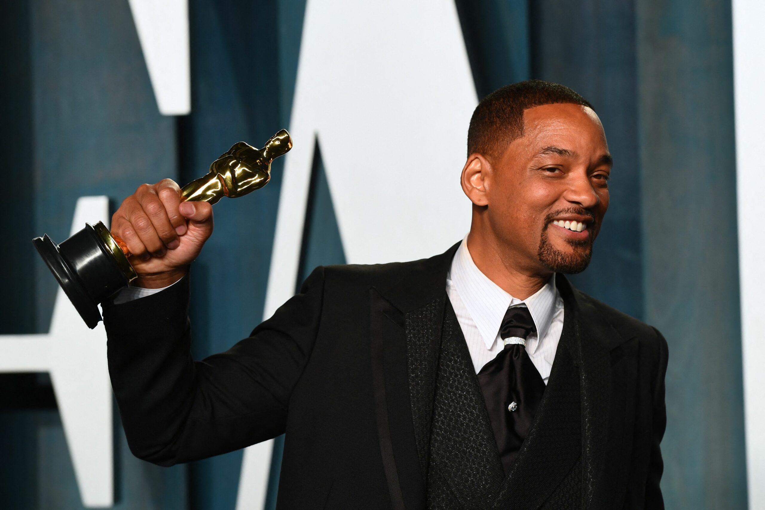 Actor Will Smith holds his award for Best Actor in a Leading Role for "King Richard" as he attends the 2022 Vanity Fair Oscar Party following the 94th Oscars at the The Wallis Annenberg Center for the Performing Arts in Beverly Hills, California on March 27, 2022. Photo by PATRICK T. FALLON/AFP via Getty Images