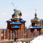 A view shows a damaged church in Volnovakha