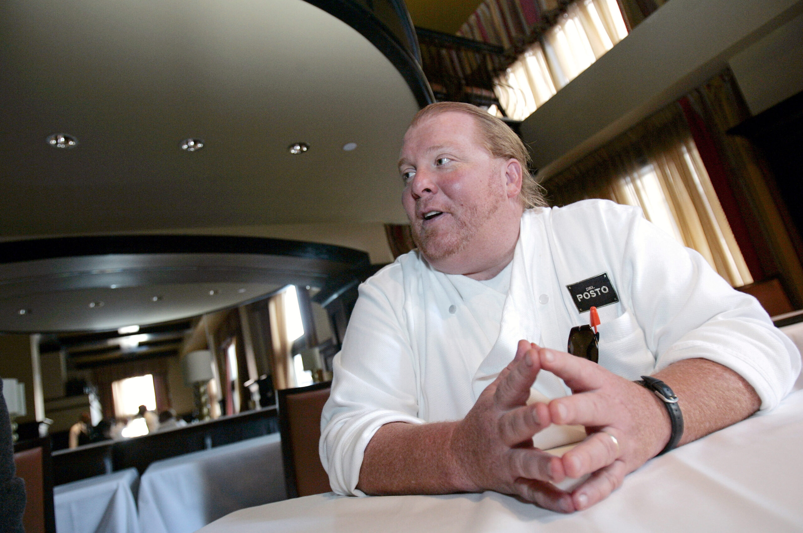 Celebrity chef Mario Batali talks during an interview with Reuters at his latest restaurant, Del Posto, in New York. Photo by Brendan McDermid/Reuters