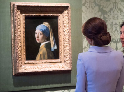 FILE PHOTO: Britain's Kate, the Duchess of Cambridge views Girl with a Pearl Earring by Johannes Vermeer during a visit to...