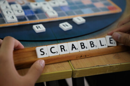 A player forms the word "Scrabble" with tiles during a practice session, in this posed picture taken in Kuala Lumpur, Mala...