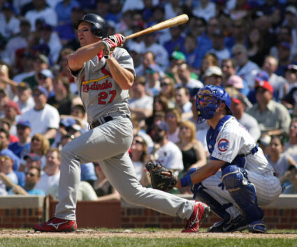 St Louis Cardinals batter Scott Rolen hits a solo home run in Chicago