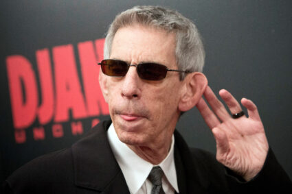 FILE PHOTO: Comedian Richard Belzer gestures as he attends the 'Django Unchained' Premiere in New York