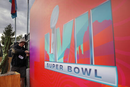 Workers prepare the stadium for Super Bowl LVII in Glendale
