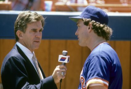 Broadcaster Tim McCarver (L) talks with New York Mets catcher Gary Carter (R) before a Major League Baseball game circa 1980's at Shea Stadium in Flushing, New York. Photo by Focus on Sport/Getty Images