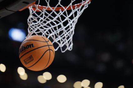 A basketball displaying the March Madness logo enter the basket before the game between the USC Trojans and the Michigan State Spartans at Nationwide Arena in Columbus, OH on Mar 17, 2023. Photo by Rick Osentoski-USA TODAY Sports via REUTERS