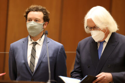 Actor Danny Masterson stands with his lawyer Thomas Mesereau as he is arraigned on three rape charges in separate incident...