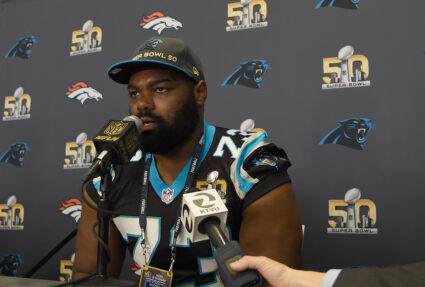 Then-tackle Michael Oher of the Carolina Panther addresses the media prior to Super Bowl 50 at the San Jose Convention Center/ San Jose Marriott on February 2, 2016 in San Jose, California. Photo by Thearon W. Henderson/Getty Images
