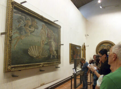 Visitors look the painting "The Birth of Venus", 1486, by Sandro Botticelli at the Uffizi Gallery Museum in Florence