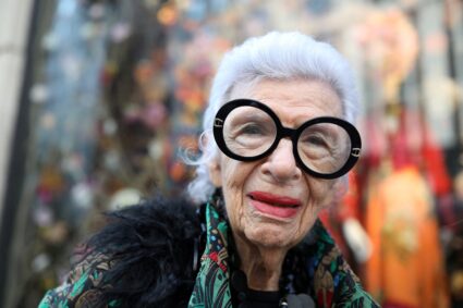 FILE PHOTO: Fashion icon and businesswoman Iris Apfel looks at the window displays at Bergdorf Goodman in Manhattan, New Y...